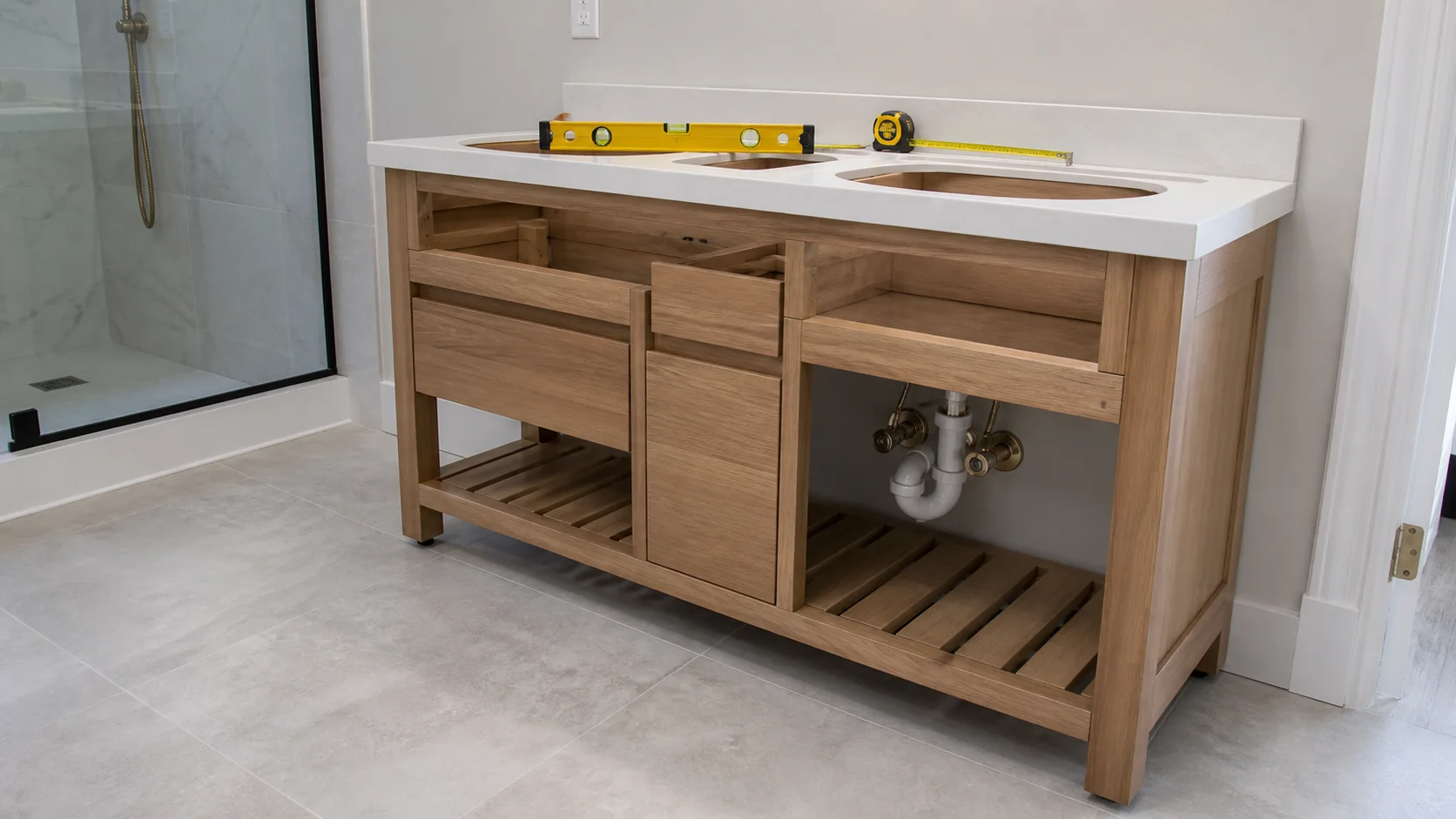 Bathroom vanity assembly budget showing cabinet top sink plumbing wall and mirror